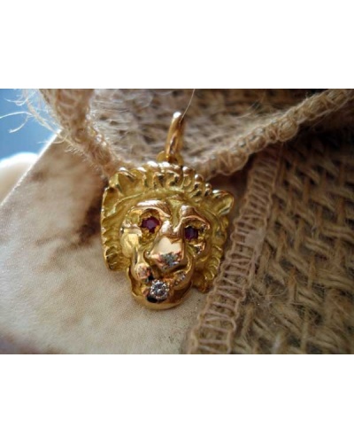 Colgante cabeza de león diamante rubí oro amarillo 750