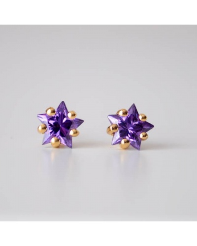 Boucles d'oreilles étoiles mauves zirconiums or jaune 750