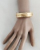 Bracelet jonc ouvrant ciselé or jaune 750 16 mm