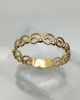 Anillo calado motivo fantasía 4 mm de ancho en oro amarillo 18k